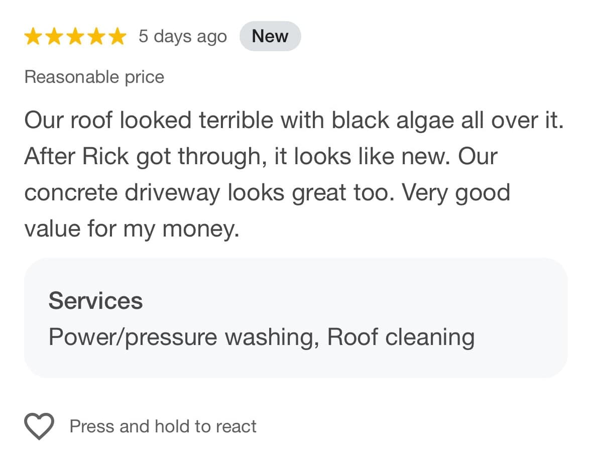 Five-star customer review praising a roof wash, concrete driveway cleaning, and the value of the work